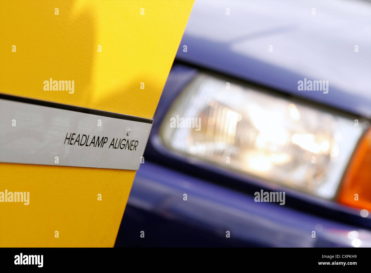 Headlamp aligner with car headlight Stock Photo Alamy