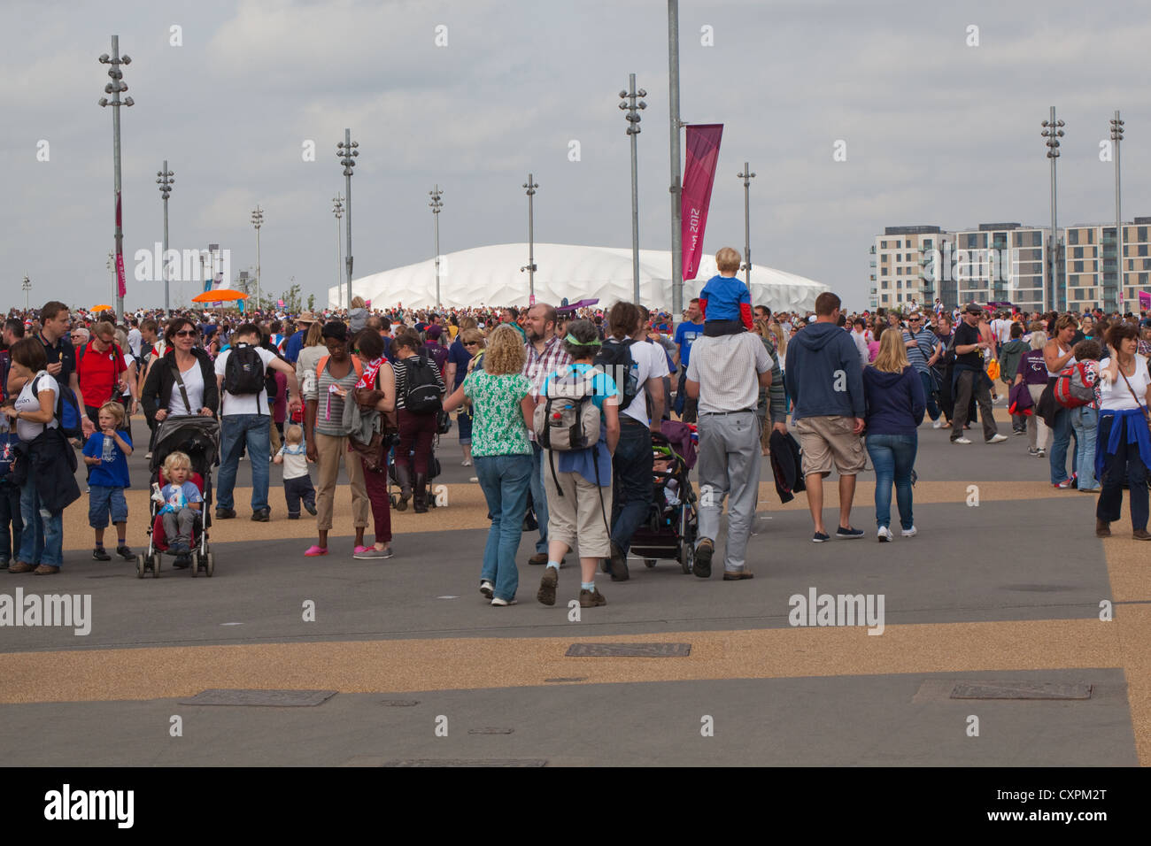 People (Homo sapiens). Crowds. Walking around Olympic Park. London. England. UK Stock Photo