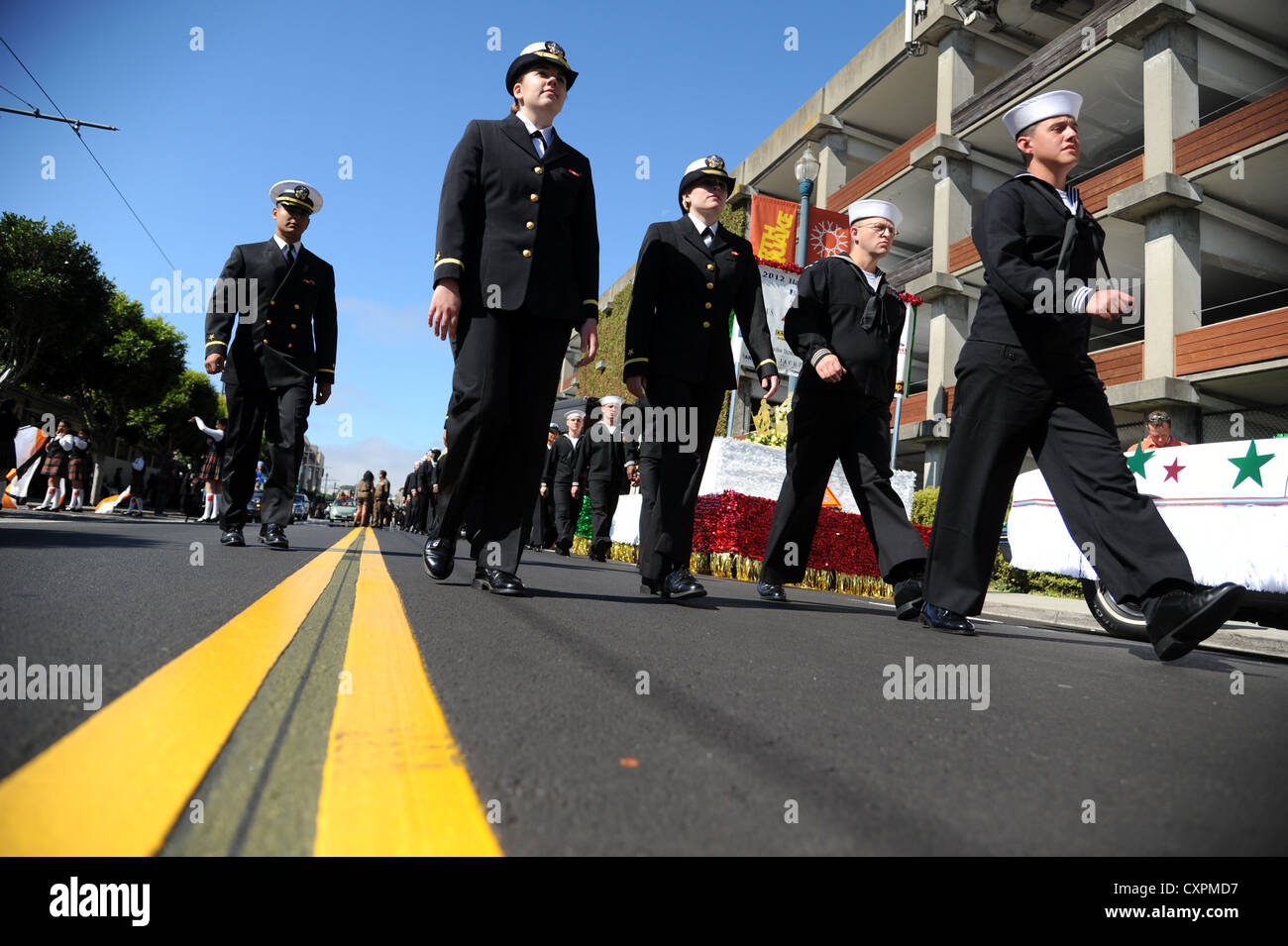 Sailors of the amphibious assault ship USS Makin Island (LHD 8) prepare to participate in the Italian Heritage Parade during San Francisco Fleetweek. San Francisco Fleet Week is a five-day event which highlights the equipment, technology and operational capabilities of the military's sea services and their history in the San Francisco area. Stock Photo