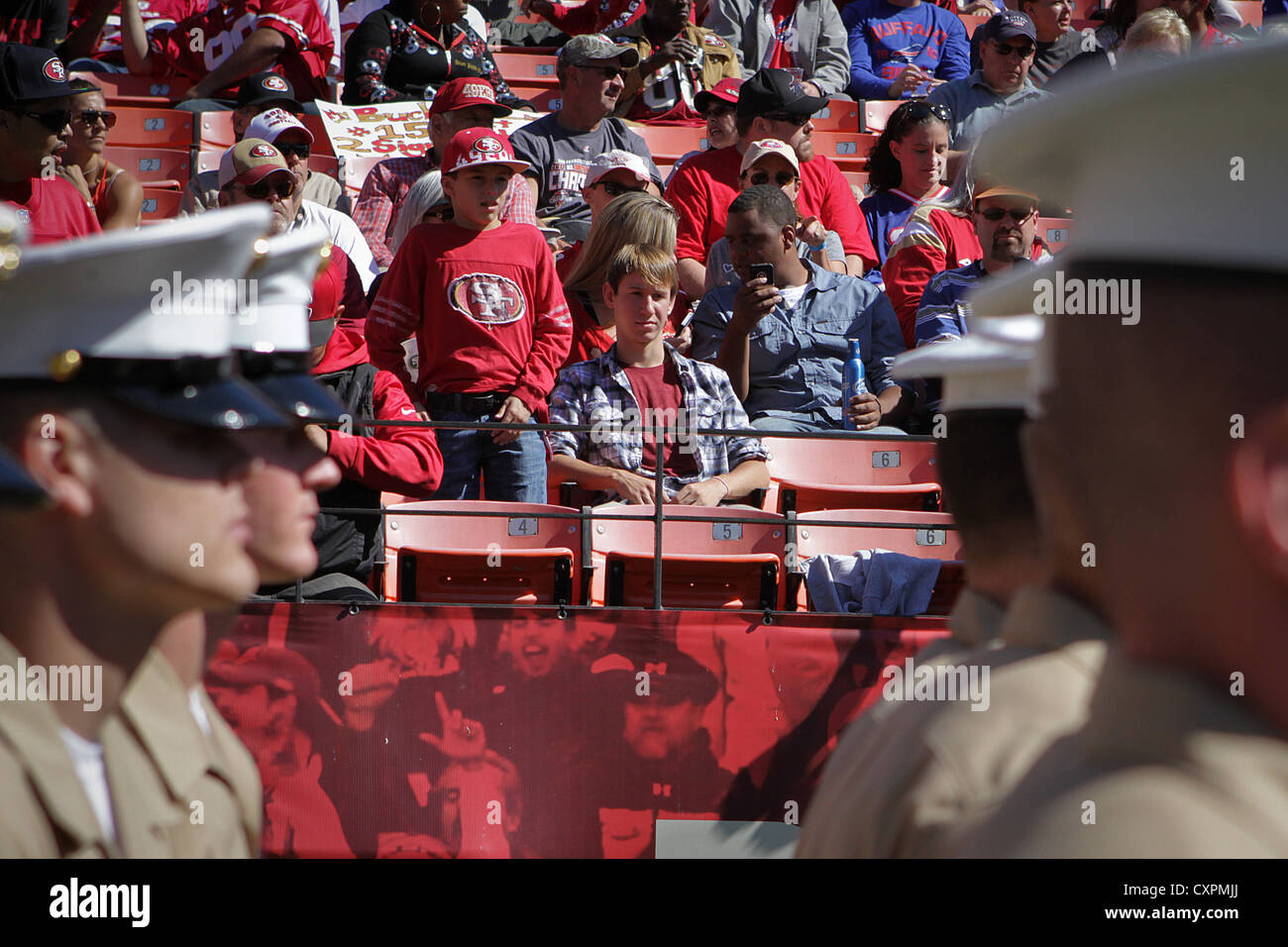 Spectators at the 49ers game at Candlestick Park were pleased to see their nation’s military and members of the Royal Canadian Navy at the pregame show Oct. 7, 2012. Service members saluted during the singing of the national anthem and received a standing ovation as they left the field. Stock Photo