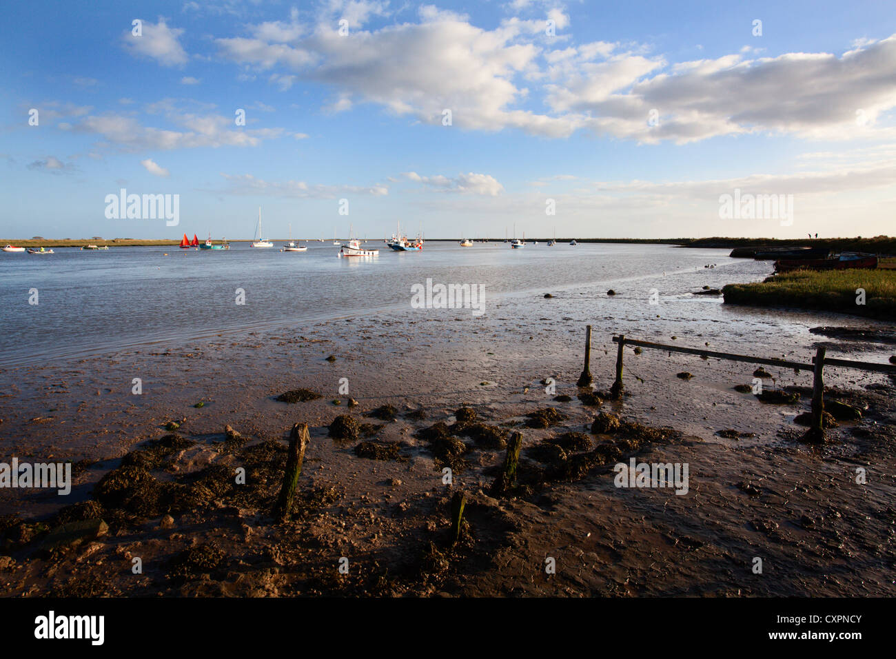 Boats in the River at Orford Quay Orford Suffolk England Stock Photo