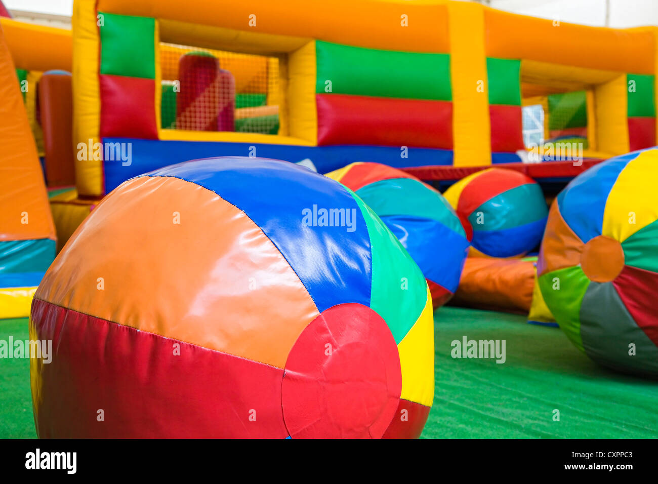 Colored balls and toys in a children play center Stock Photo
