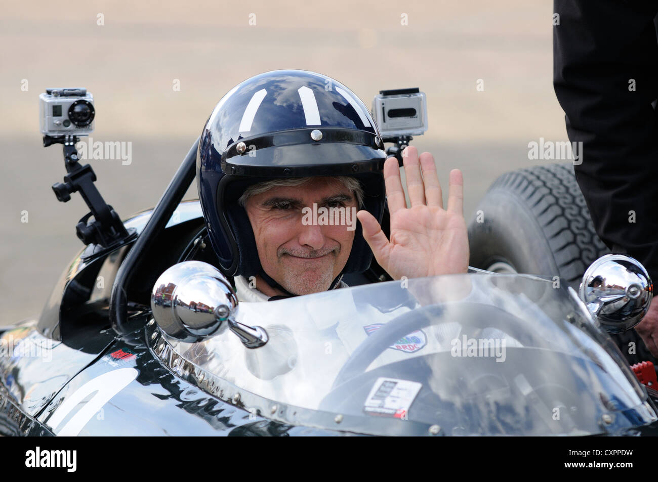 Damon Hill driving his father Graham Hill's favourite car 'Old Faithful