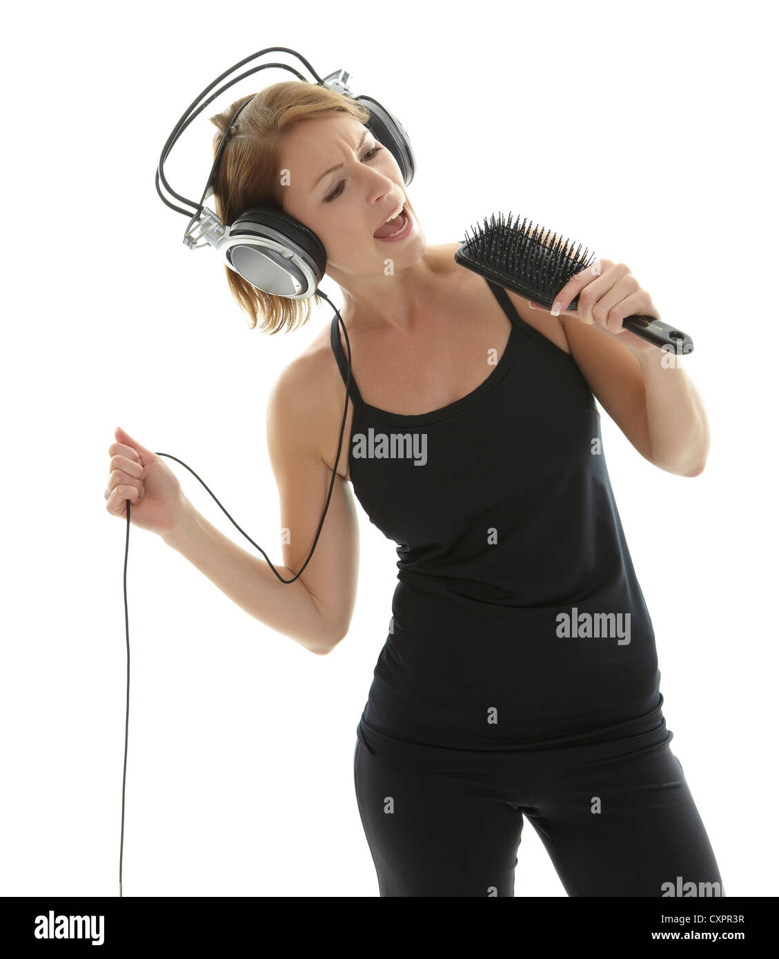 Singing hairbrush woman hi-res stock photography and images - Alamy