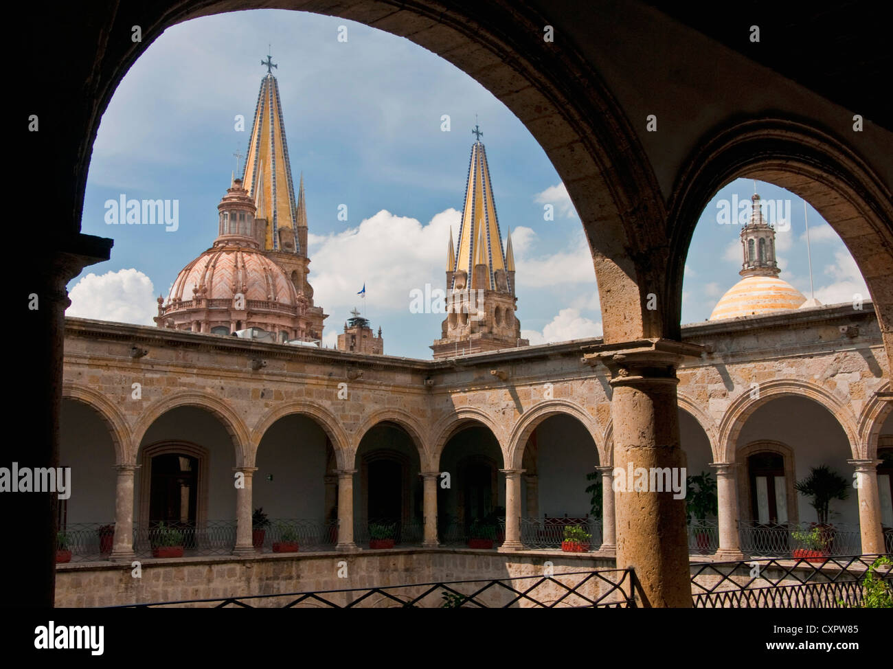 Spires of Guadalajara's Metropolitan Cathedral Templo Santa Maria de Gracia from courtyard of Government Palace Stock Photo