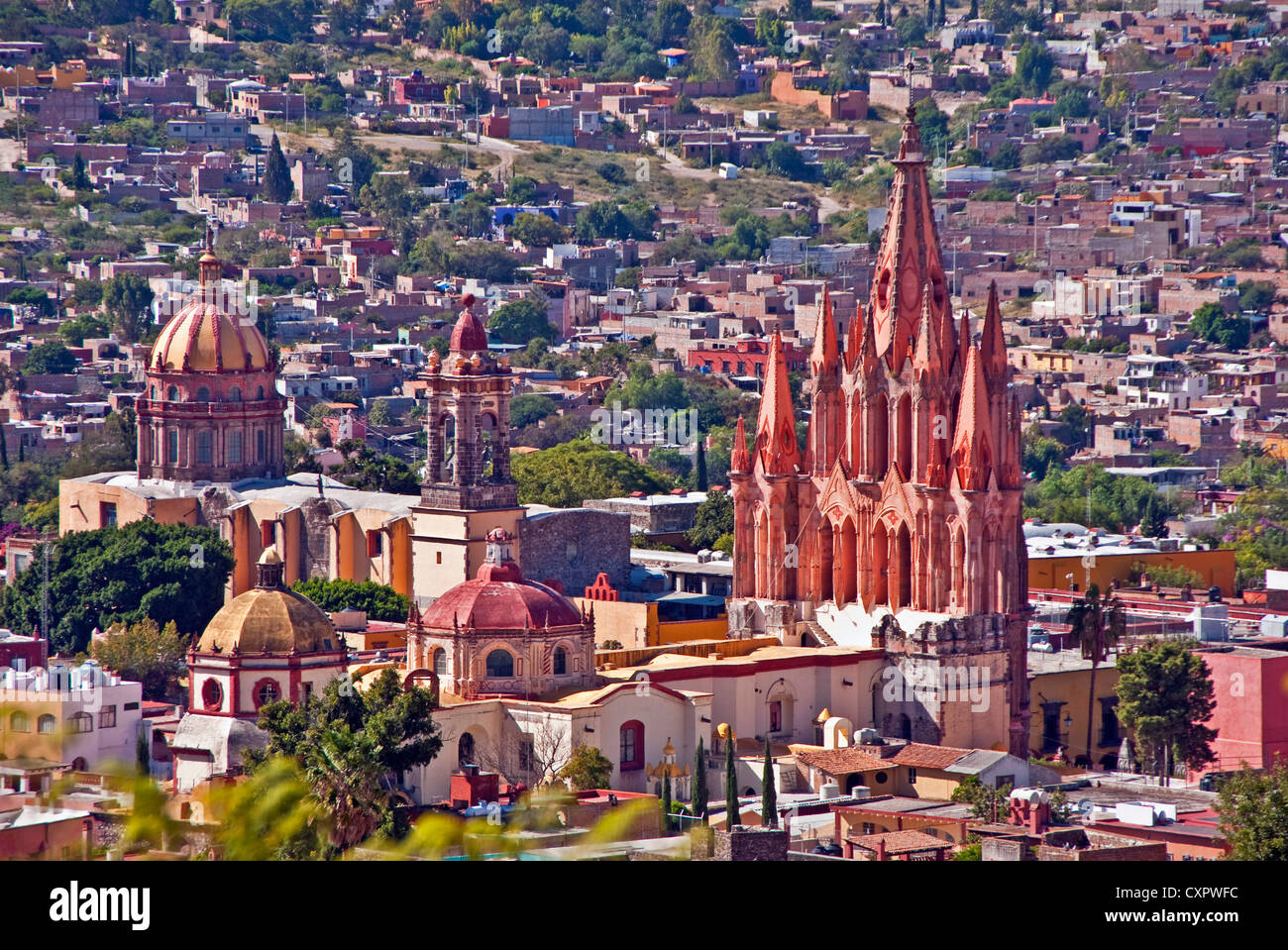 San Miguel de Allende's gothic spires of La Parroquia de San Miguel Arcangel (Church of St. Michael the Archangel), at right Stock Photo