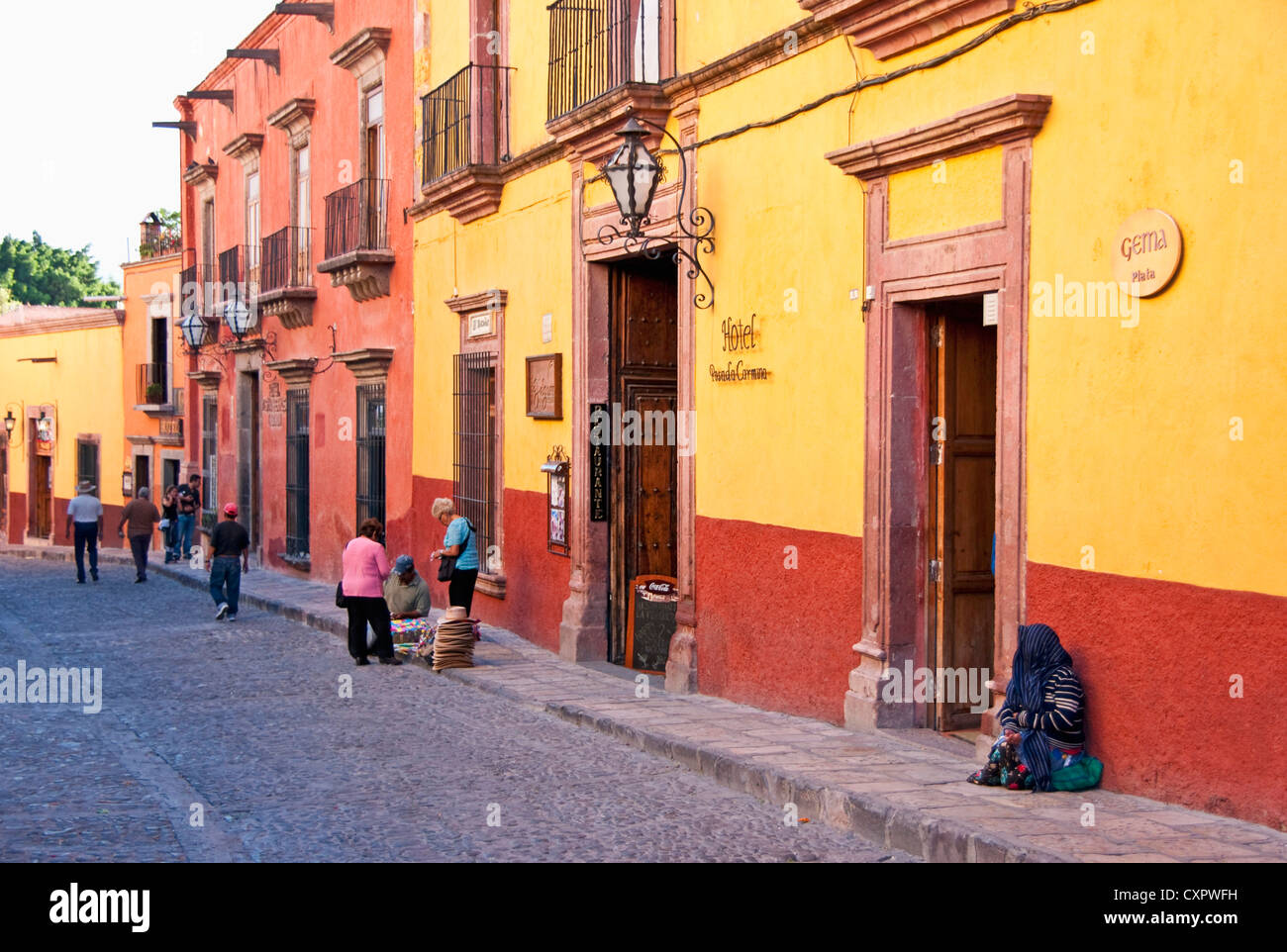 San Miguel de Allende's colorful Cuna de Allende street of cobble stones near El Jardin central square Stock Photo