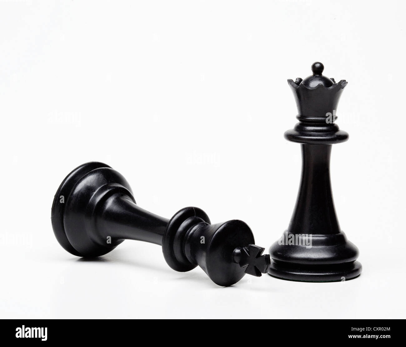 Chess queen and king piece, king fallen Stock Photo