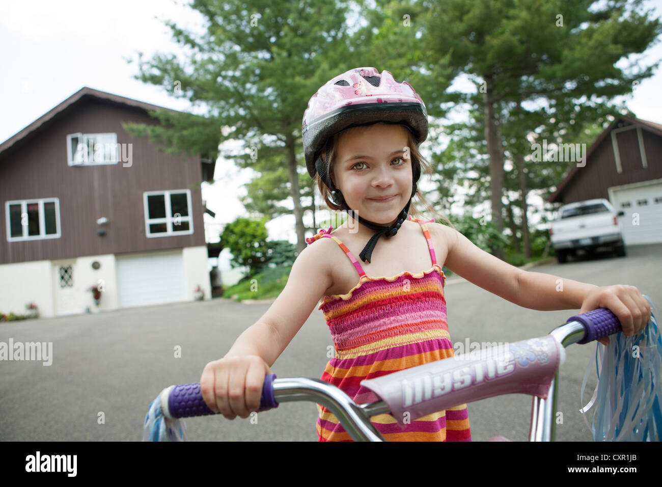 Girl on bicycle Stock Photo
