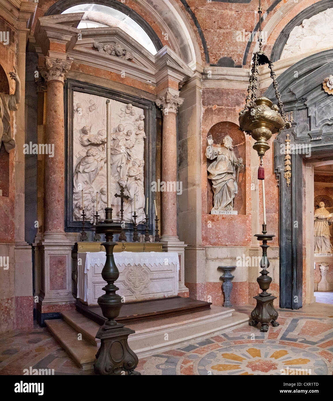 Chapel with Saint Paul statue in the side aisle of the Basilica. Mafra Palace and Convent in Portugal. Baroque architecture. Stock Photo