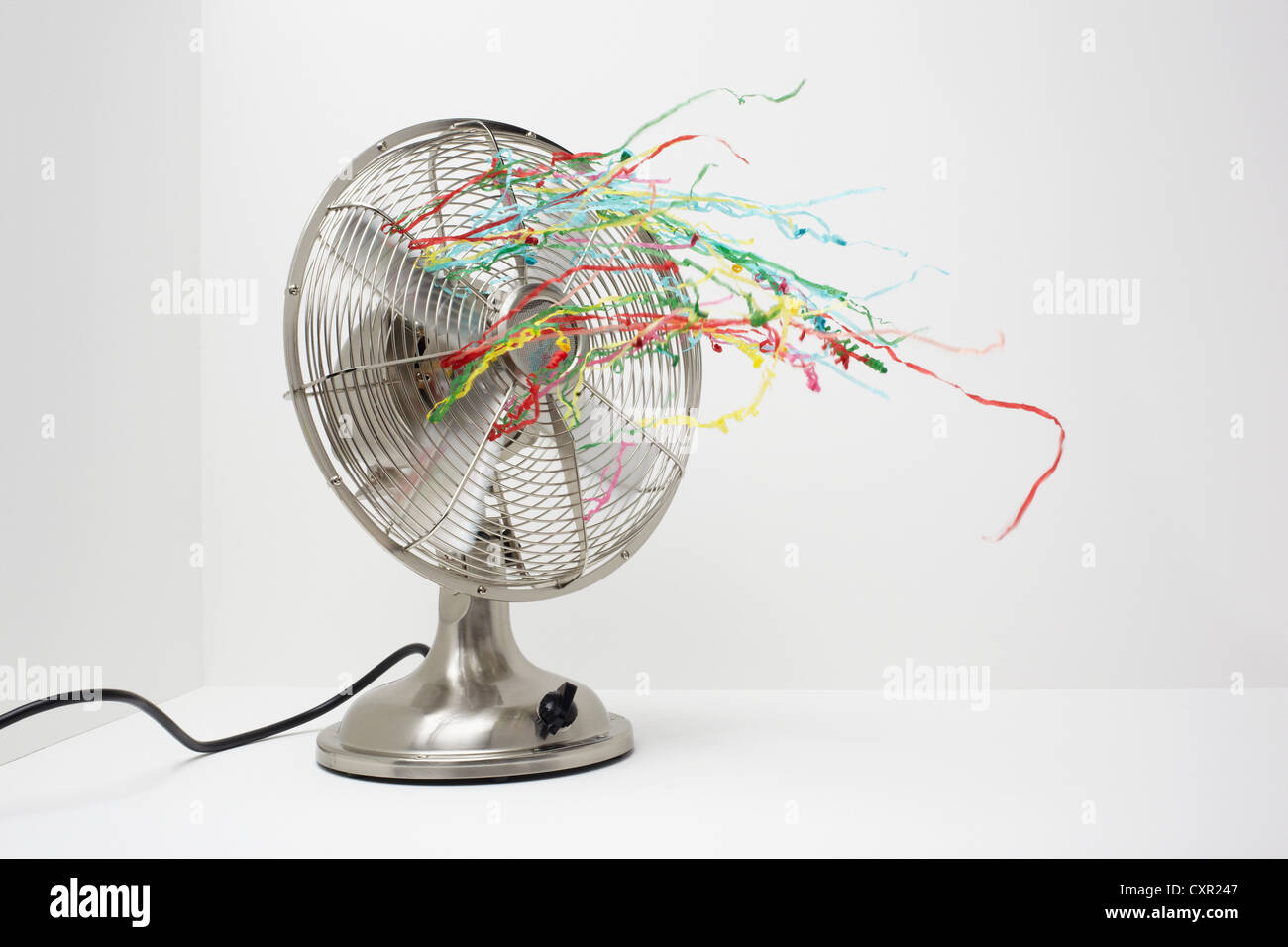 Electric fan with streamers Stock Photo