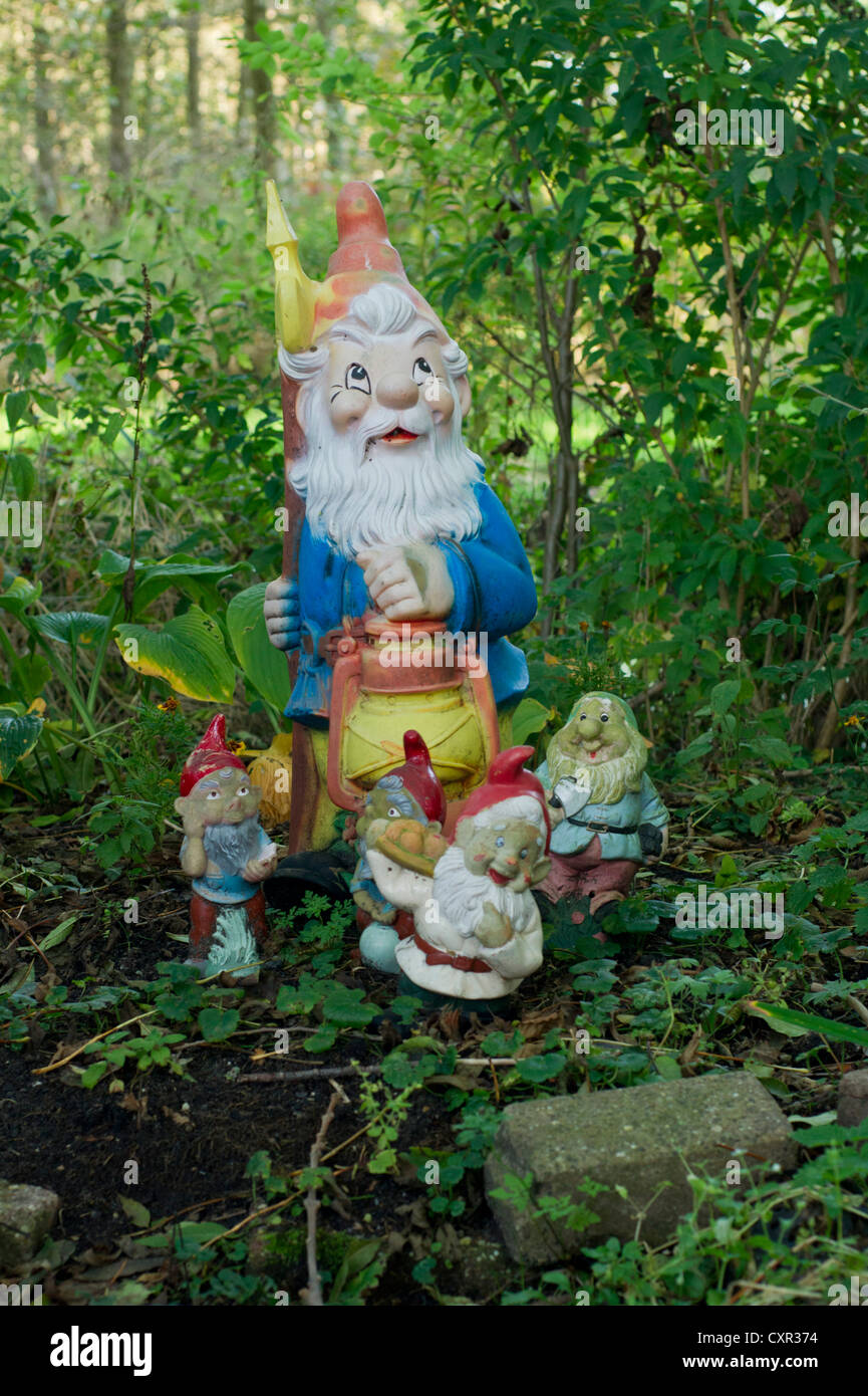 Garden gnomes in a Forest like garden Stock Photo