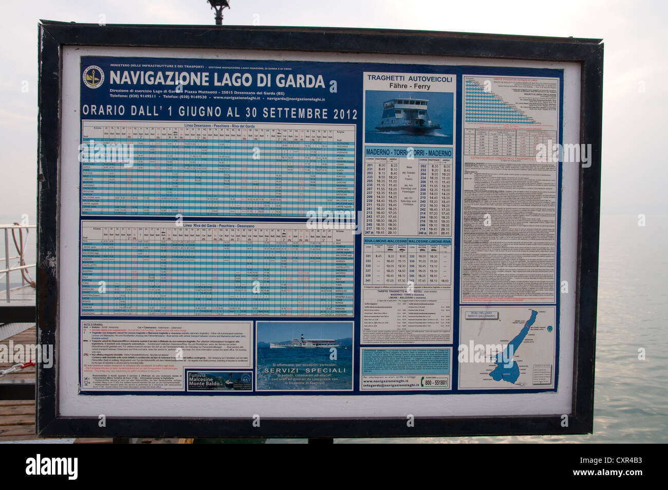 A display board of Lake Garda passenger ferry sailing times in the town