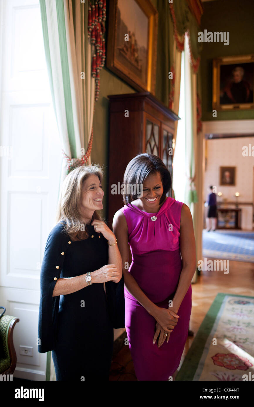 First Lady Michelle Obama waits with Caroline Kennedy Schlossberg October 31, 2011 in the Green Room of the White House before making remarks to the White House Historical Association. The White House hosted a reception to honor the group's 50th anniversary. Stock Photo