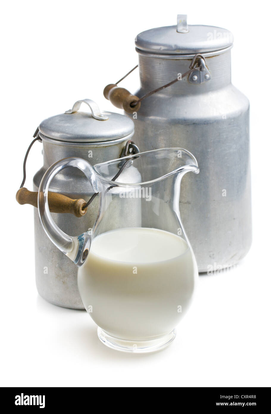 milk in a glass pitcher on white background Stock Photo