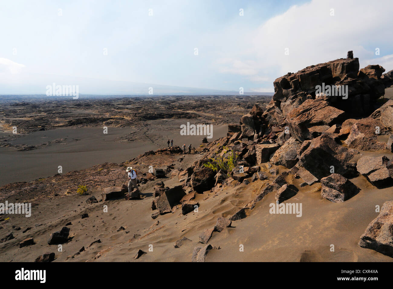 Hikers walking in the Kau Desert, Kilauea volcano, Hawaii Volcanoes