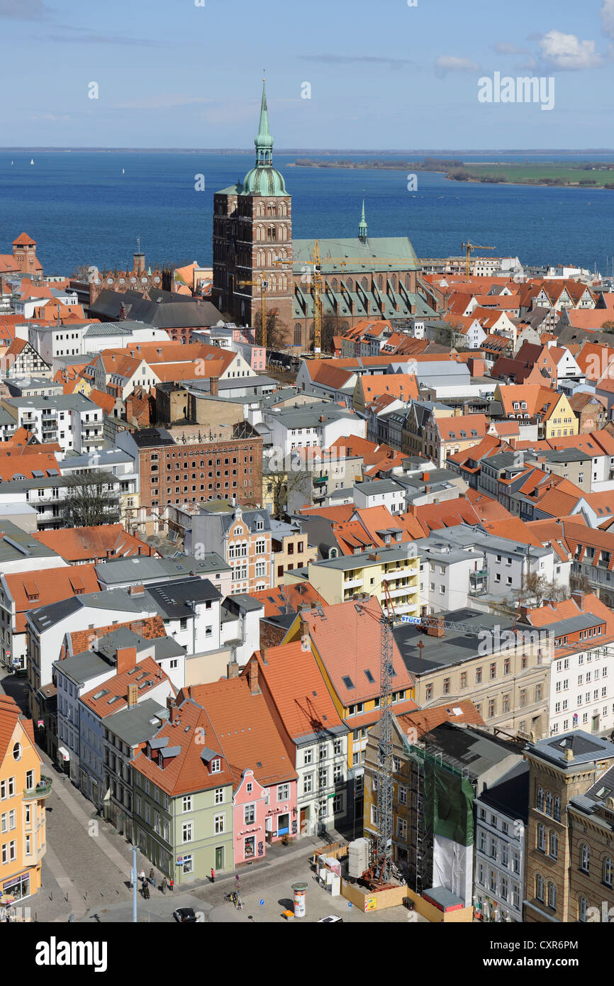 View from St. Mary's Church over the historic town centre with the Church of St. Nicholas, port and Strelasund, Stralsund Stock Photo