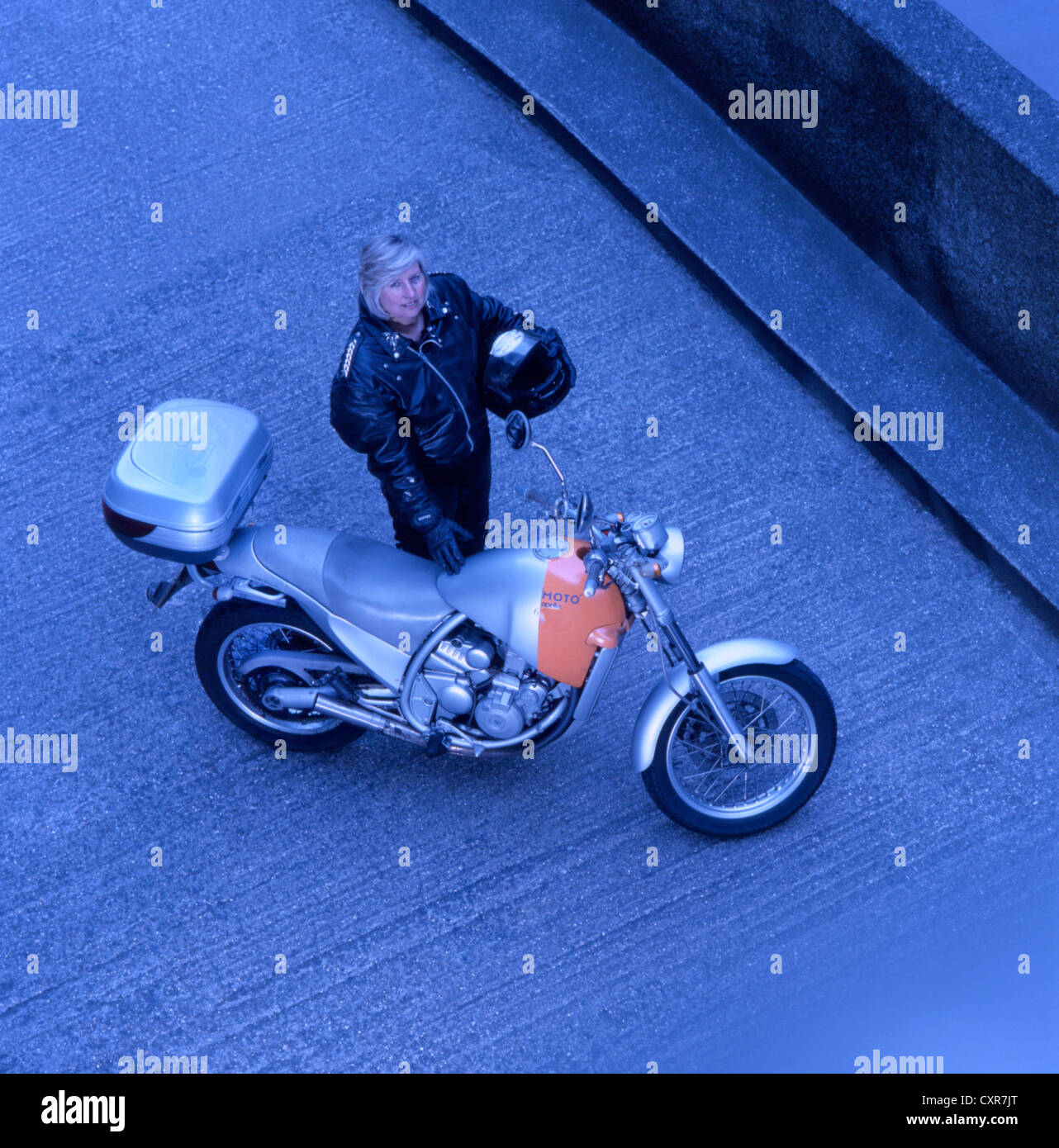 Lady Motorcyclist on Aprilia 650 Stock Photo