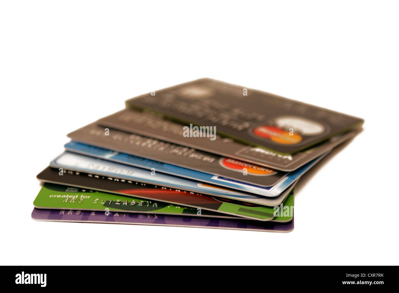 Pile of credit cards on white background, easy money on credit, financial troubles, cut out & balance transfers. Stock Photo