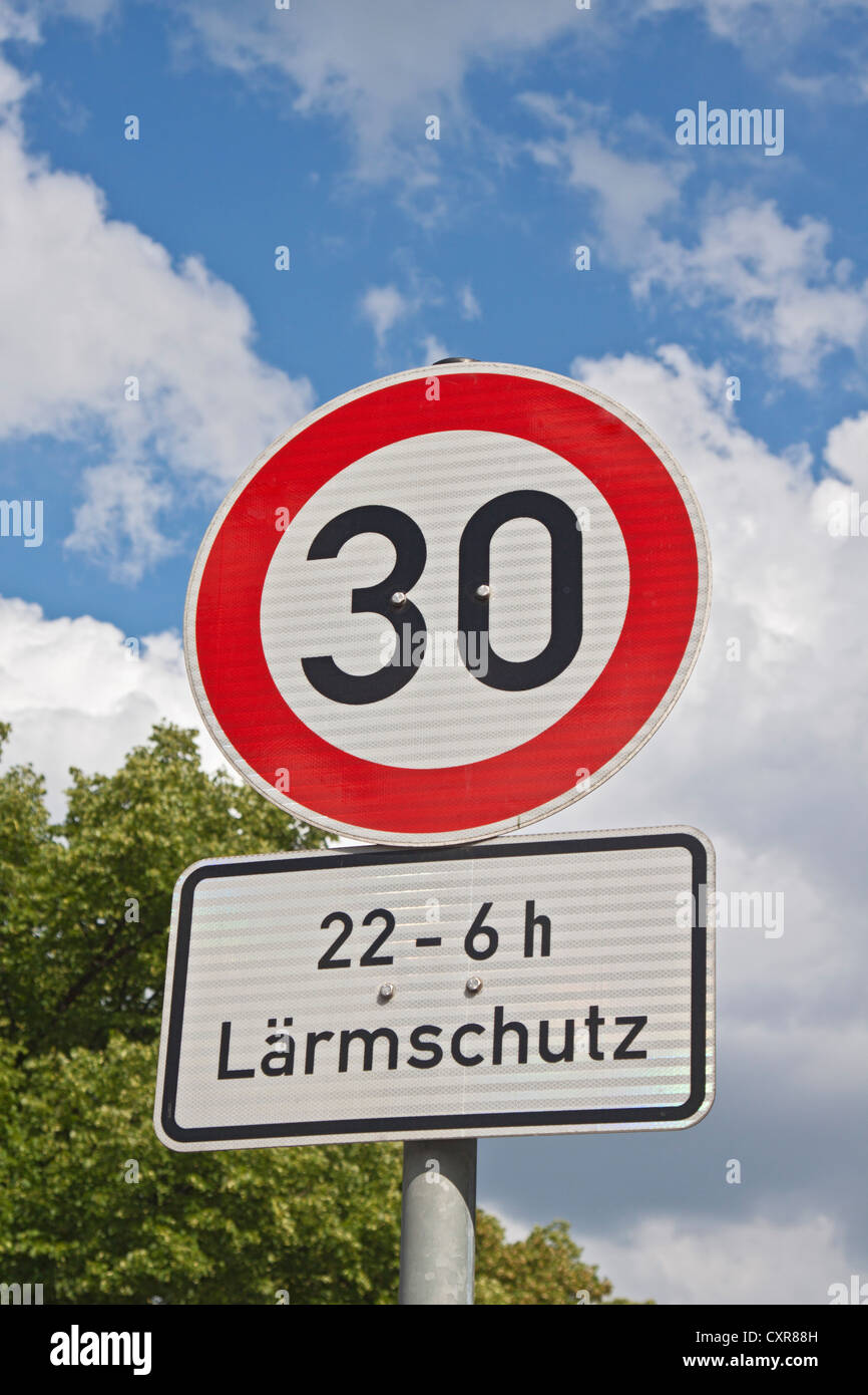 Road sign, speed limit at 30 km/h, 22-06 hours, Laermschutz, German for 'noise control' Stock Photo