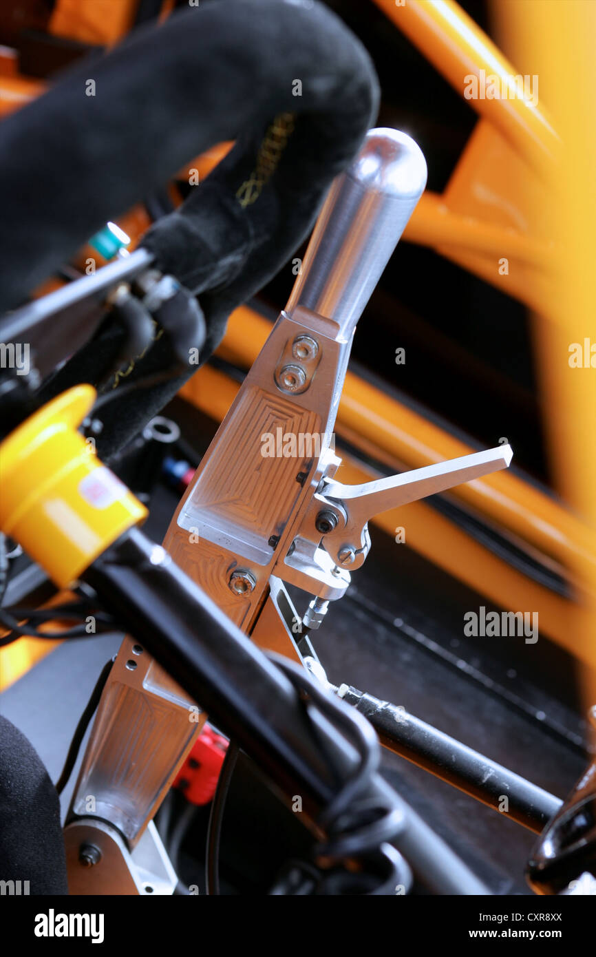 Handbrake and steering wheel in race car Stock Photo Alamy