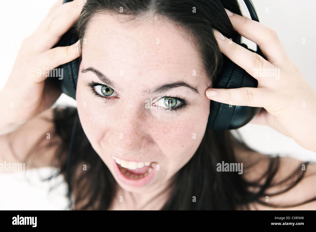 Person crying headphones hi-res stock photography and images - Alamy
