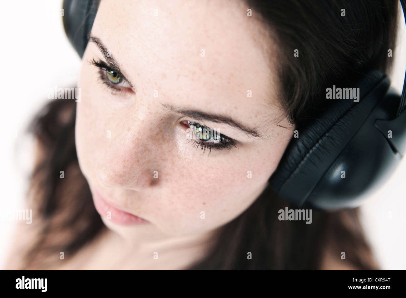 Young woman wearing headphones Stock Photo