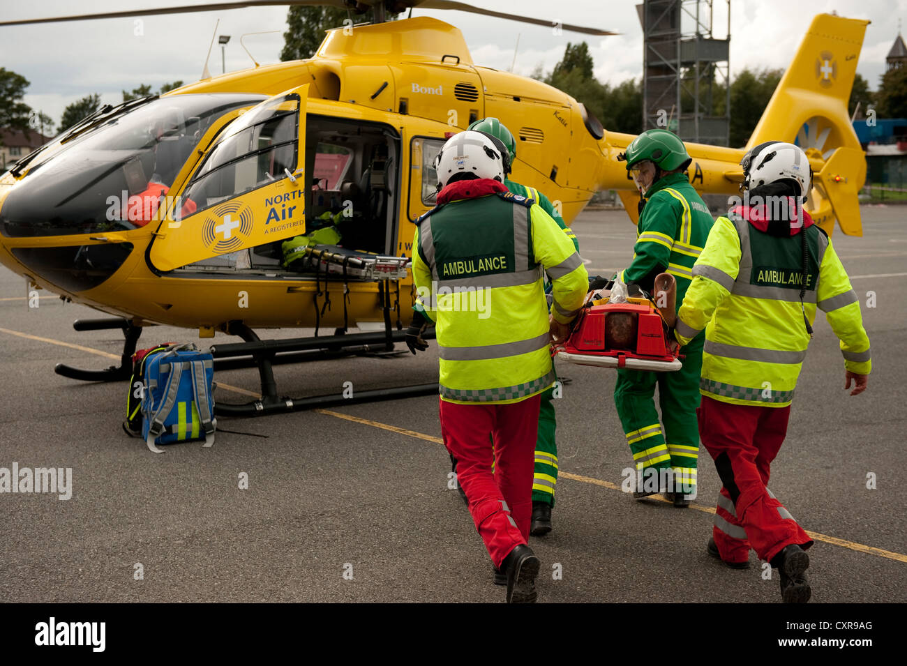 Ambulance Paramedics load patient on helicopter Stock Photo Alamy