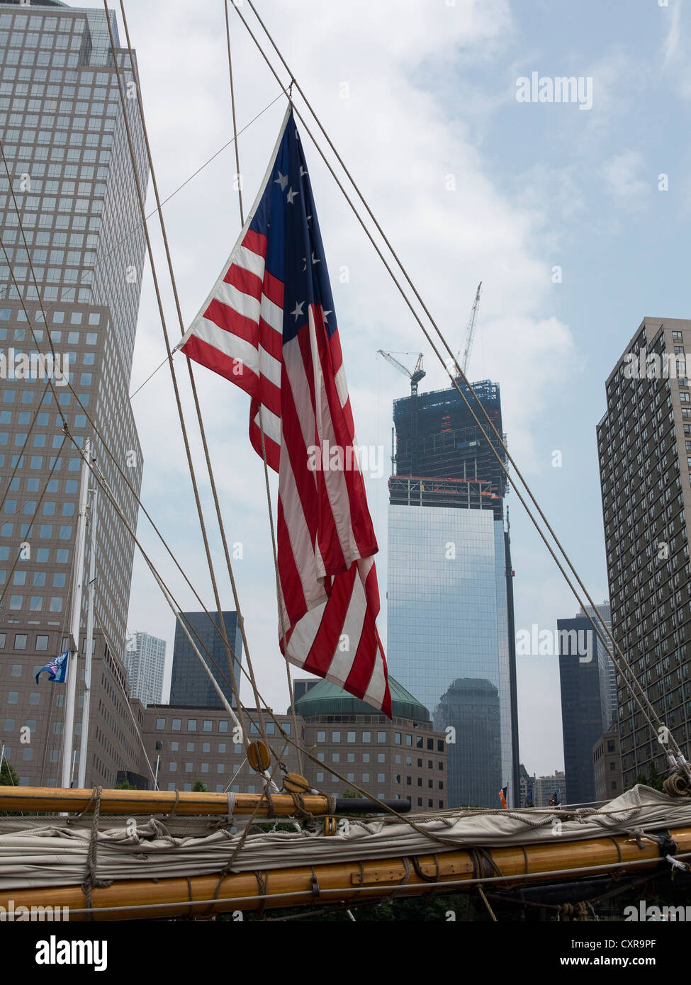 U.S. flag on a sailing ship in front of the Freedom Tower, New York City, USA, North America, America Stock Photo