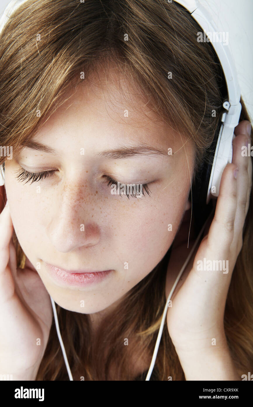 Young woman wearing headphones, portrait Stock Photo