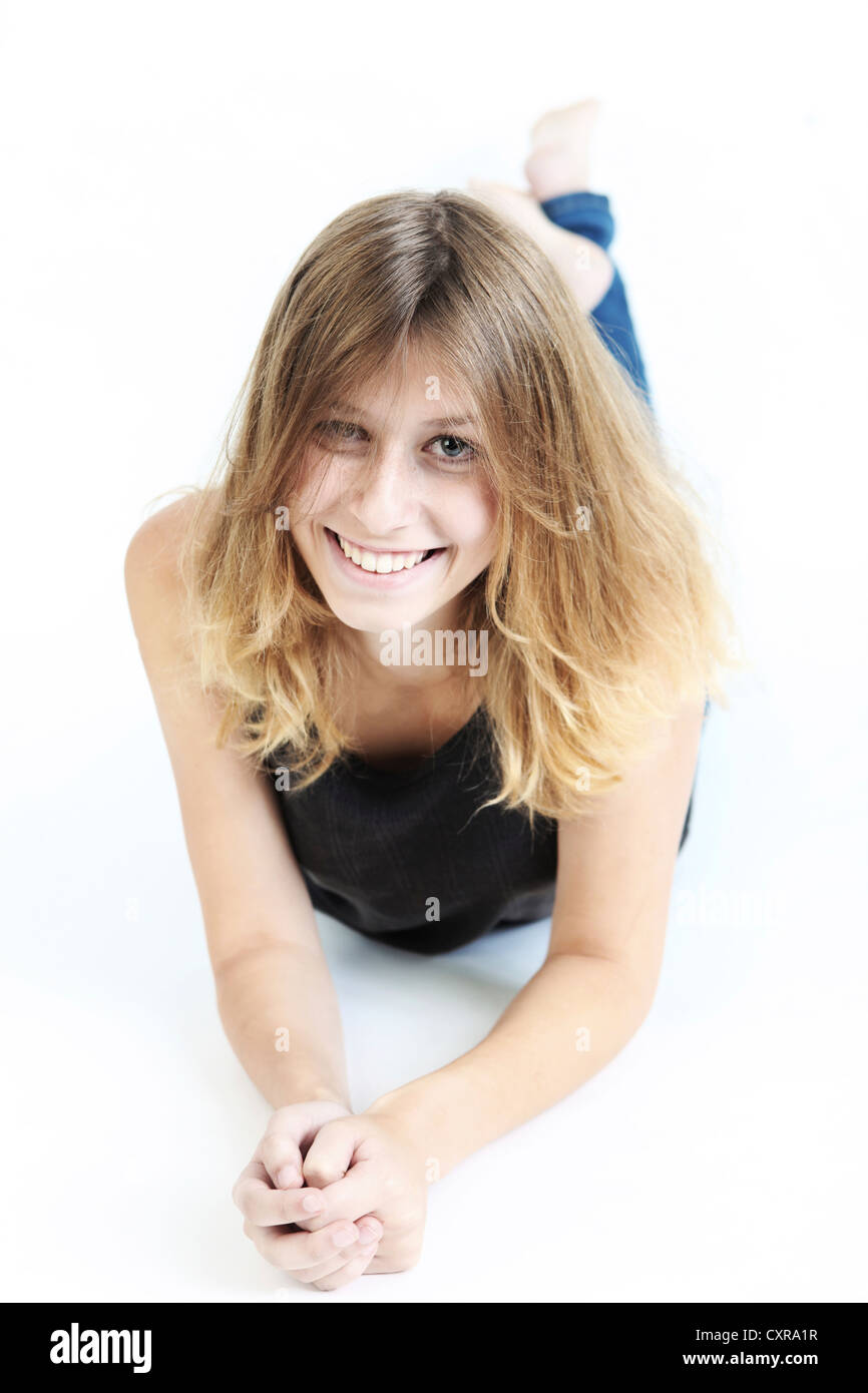 Young woman, lying down Stock Photo