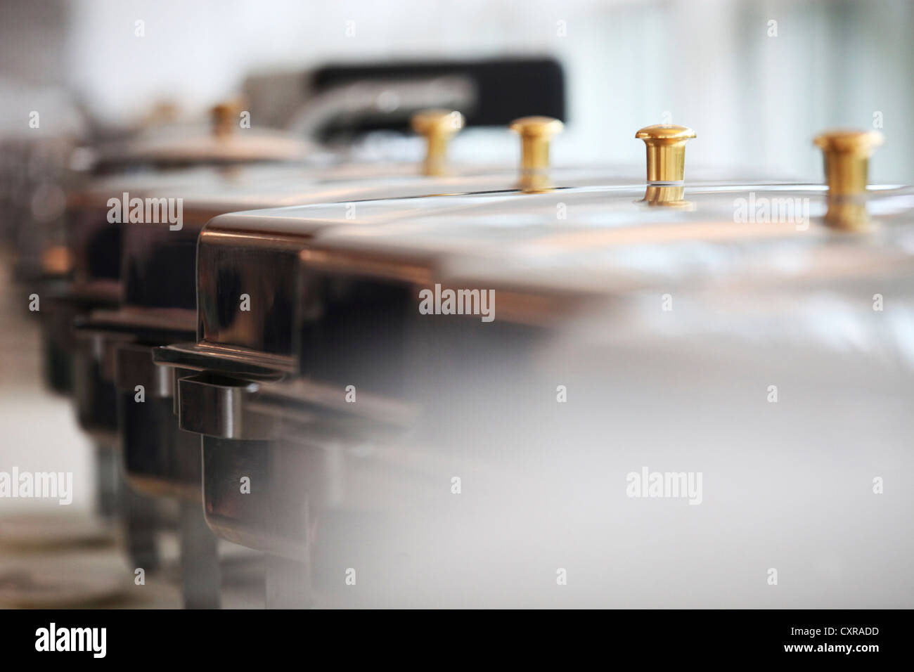 Buffet, metal containers for keeping food warm Stock Photo Alamy