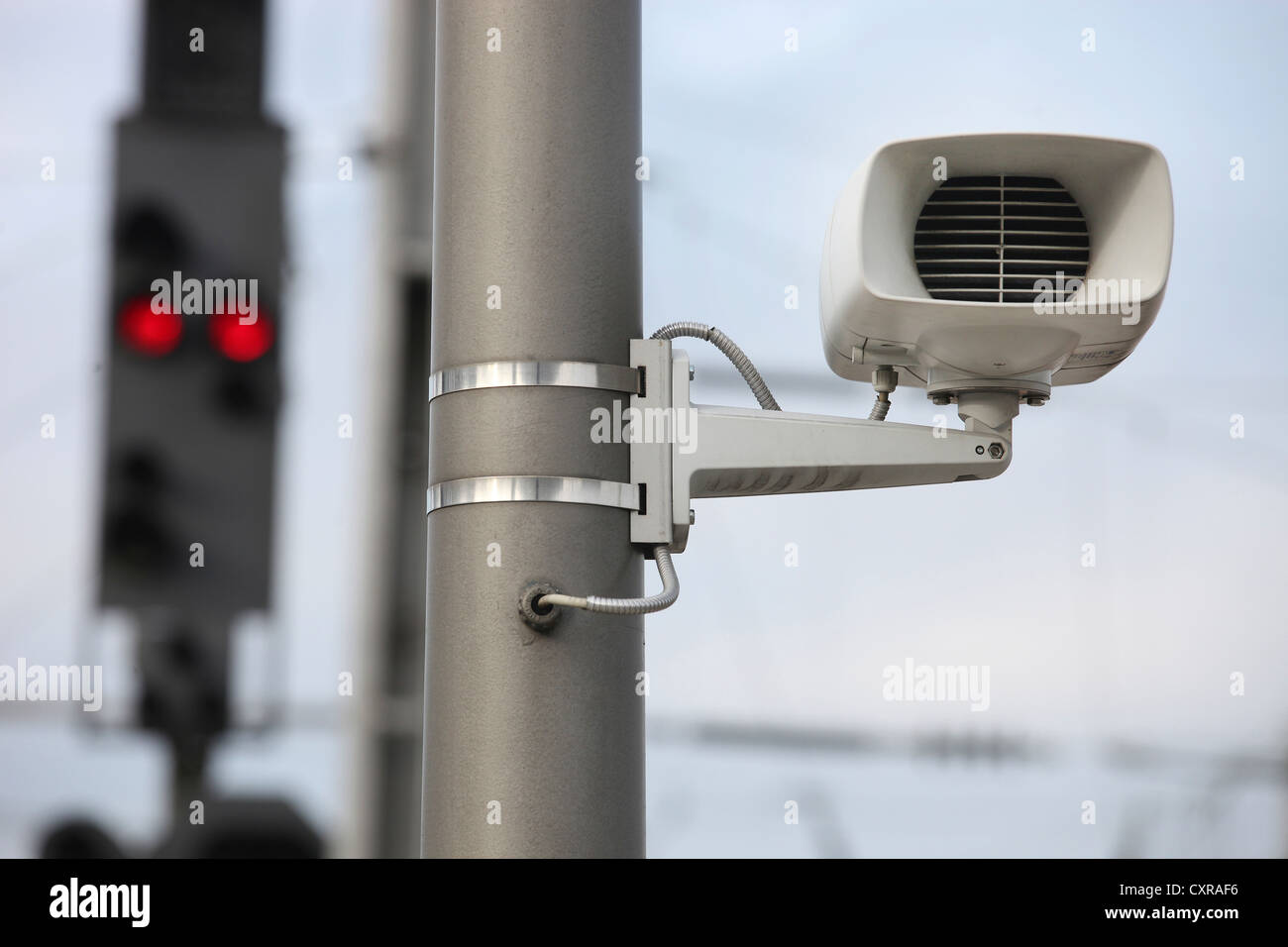 Speaker and signal at a railway station Stock Photo Alamy