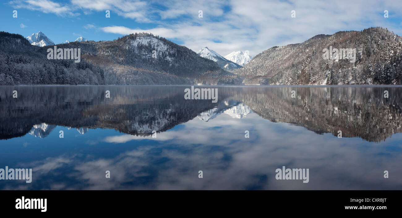 Mountains are reflected in the Alpsee Lake, Fuessen, Allgaeu, Bavaria, Germany, Europe, PublicGround Stock Photo