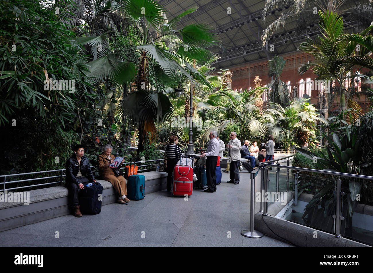 Travellers waiting in the concourse area, redesigned after the so-called 11-M bombings of 11 March 2004 Stock Photo