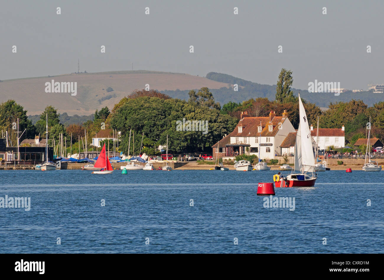 Dell Quay from Copperas Point Chichester Harbour. Trundle Hill and Goodwood behind. Stock Photo