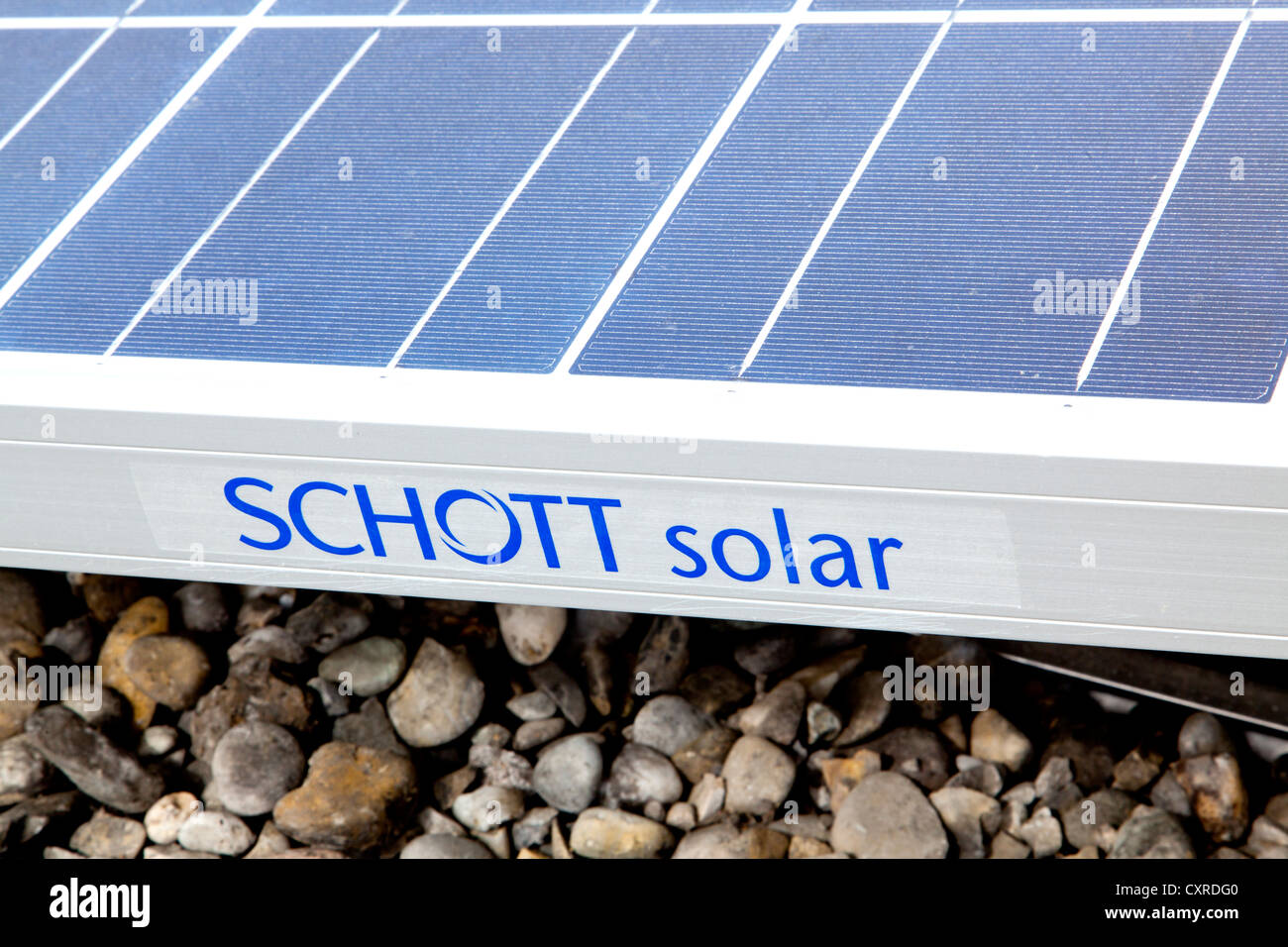 Solar panels, photovoltaic modules on a roof, produced by Schott Solar AG, lettering, Regensburg, Bavaria, Germany, Europe Stock Photo
