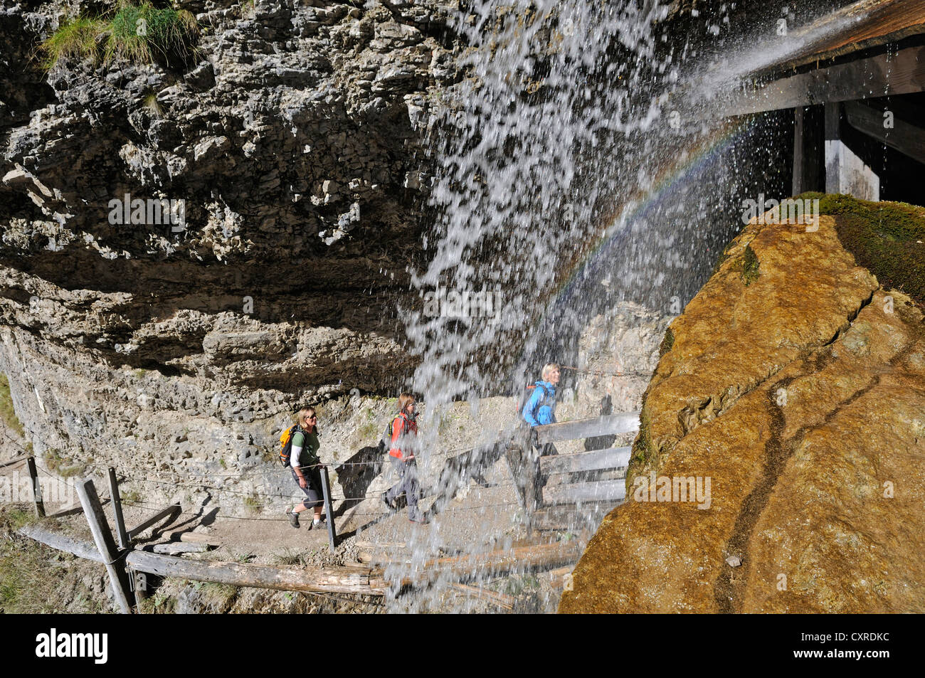 Female hikers at the Staubfall waterfall, Heutal valley, Unken, Tyrol, Austria, Europe Stock Photo