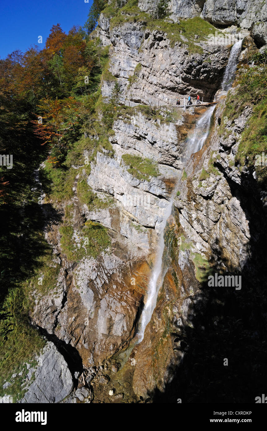 Female hikers at the Staubfall waterfall, Heutal valley, Unken, Tyrol, Austria, Europe Stock Photo