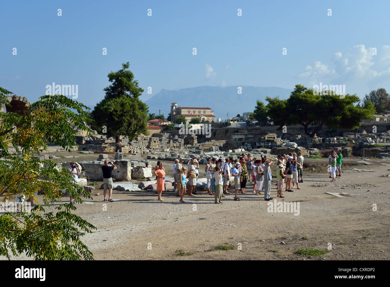 Tour group in Agora, Ancient Corinth, Corinth Municipality, Peloponnese region, Greece Stock Photo