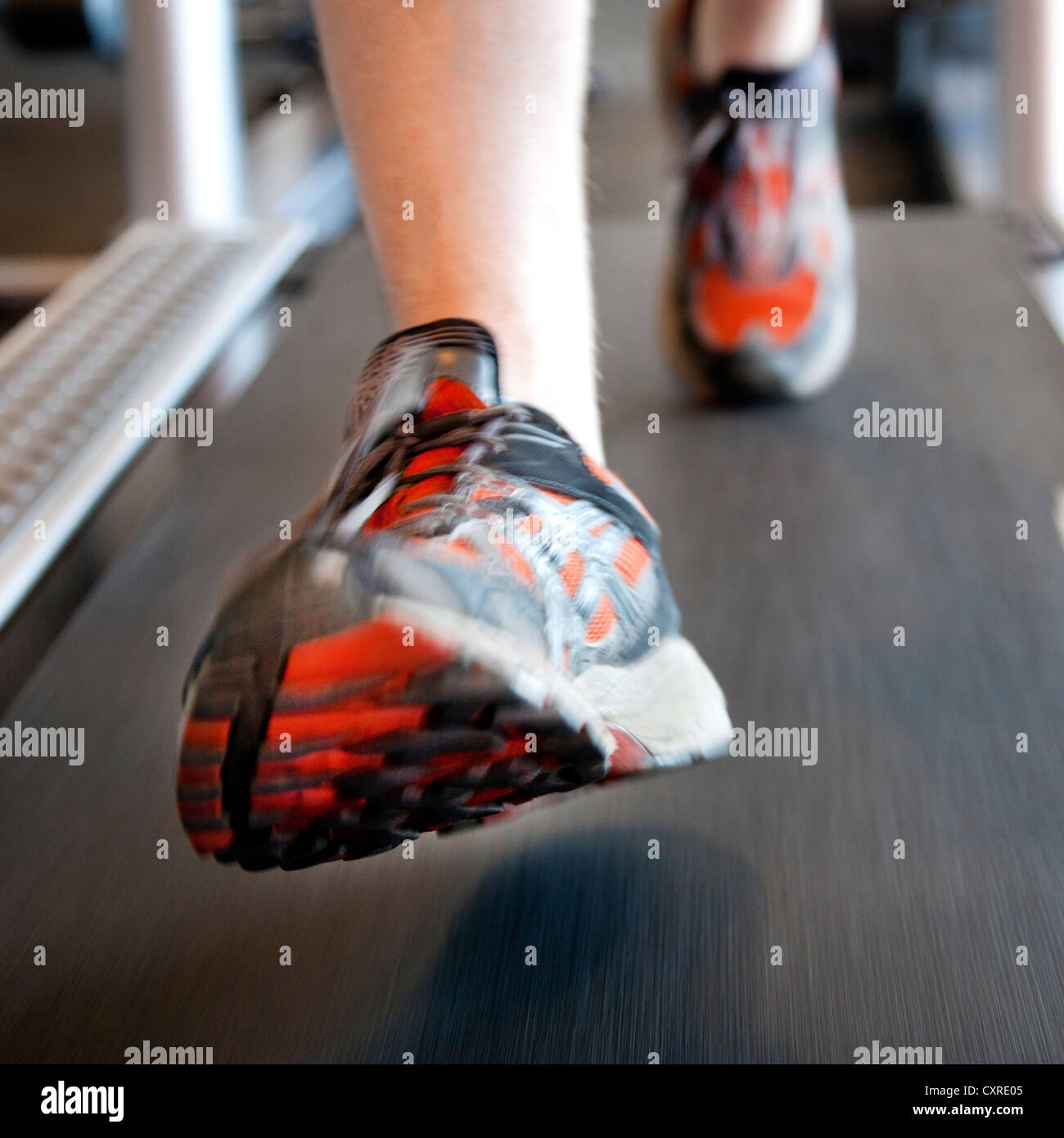 Running shoes on a treadmill at a fitness centre, Regensburg, Bavaria, Germany, Europe Stock Photo