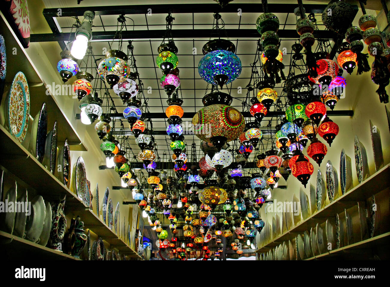 Hanging colorful electric turkish glass lanterns lamps in a shop,istanbul,turkey Stock Photo