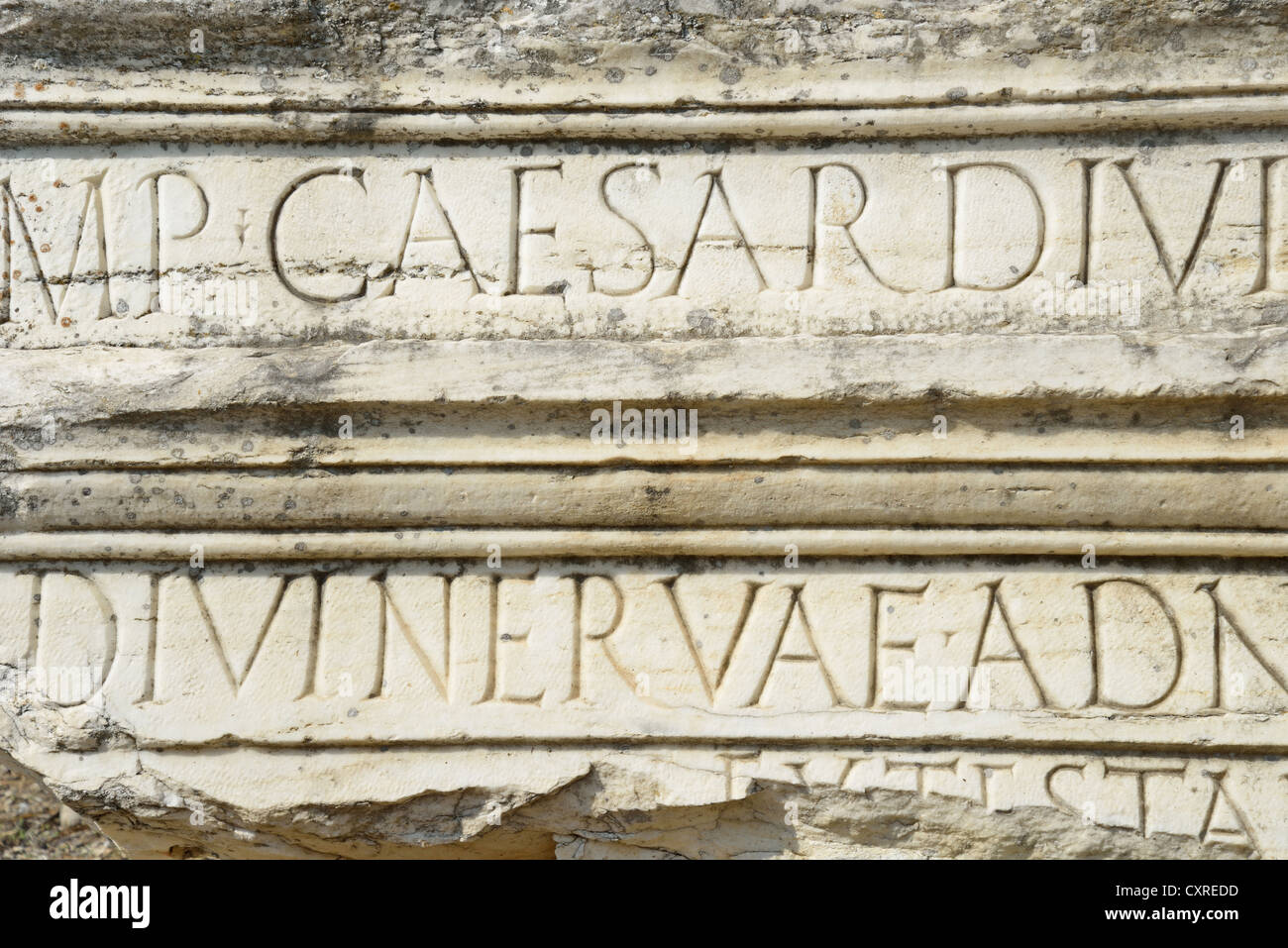 Roman Caesar inscription on marble plinth, Ancient Corinth, Corinth Municipality, Peloponnese region, Greece Stock Photo