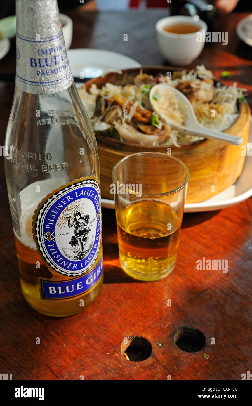 Blue Girl beer with fish at the restaurant of the Tai O Fishing Village, Lantau Island, Hong Kong, China, Asia Stock Photo