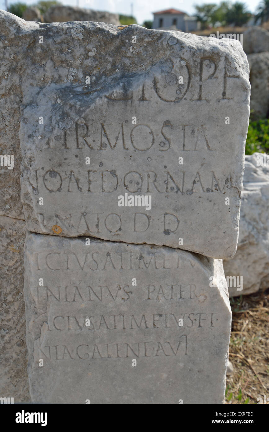 Roman inscriptions on column, Ancient Corinth, Corinth Municipality, Peloponnese region, Greece Stock Photo