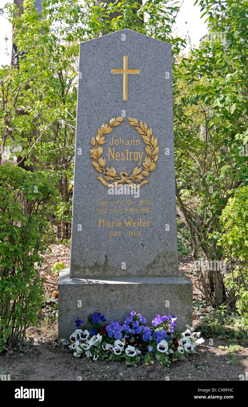 The grave of the Austrian actor Johann Nestroy in the Zentralfriedhof cemetery, Simmering,  Vienna, Austria. Stock Photo