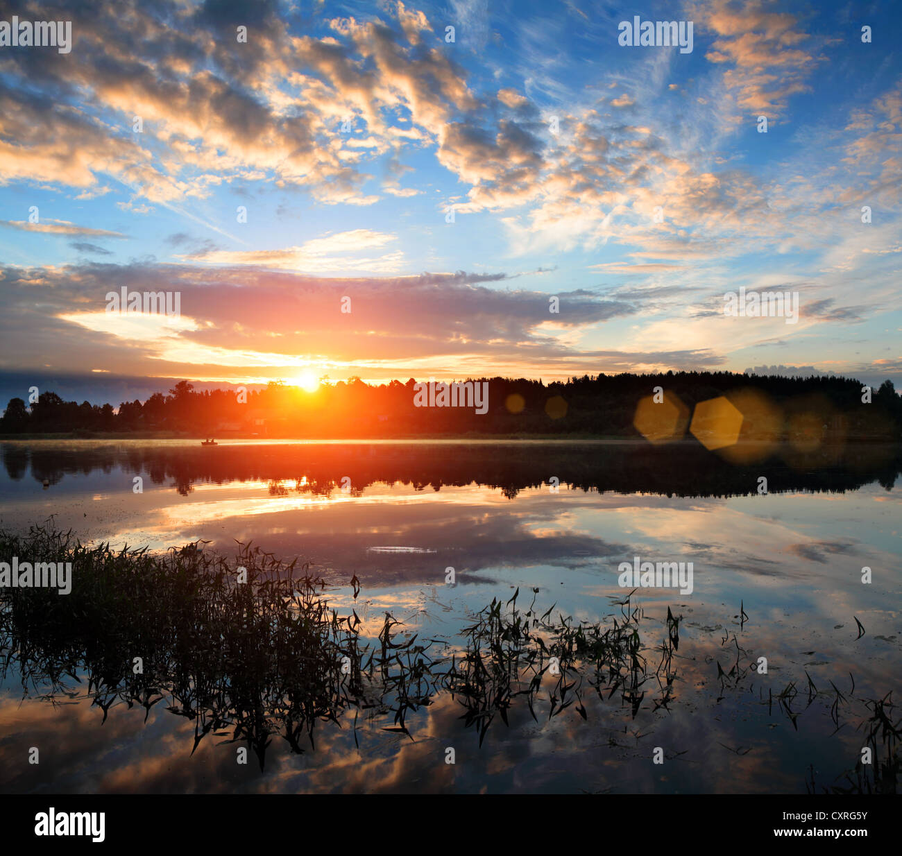 Sunrise over the river. The first rays of sun Stock Photo Alamy