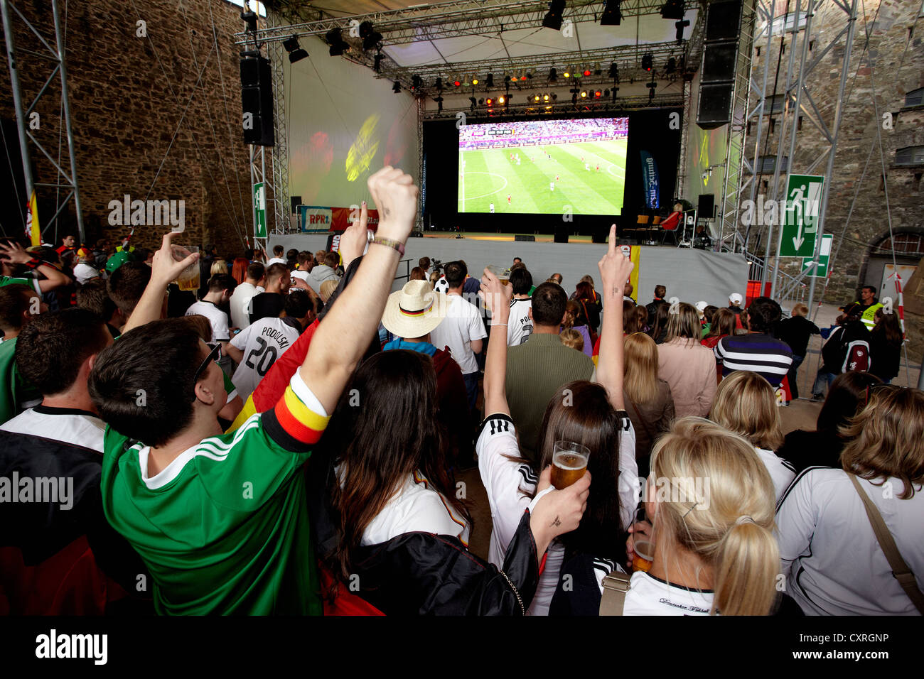 Football fans during a public viewing event at the Euro 2012 championships on Festung Ehrenbreitstein fortress, Koblenz Stock Photo