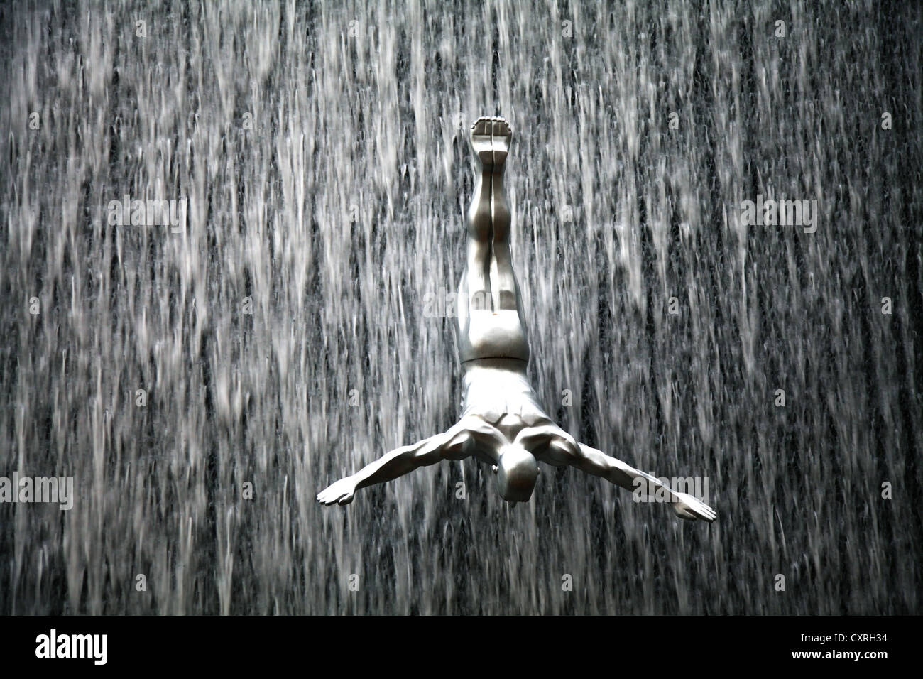 Artificial waterfall with a lifesize sculpture of a diver in Dubai