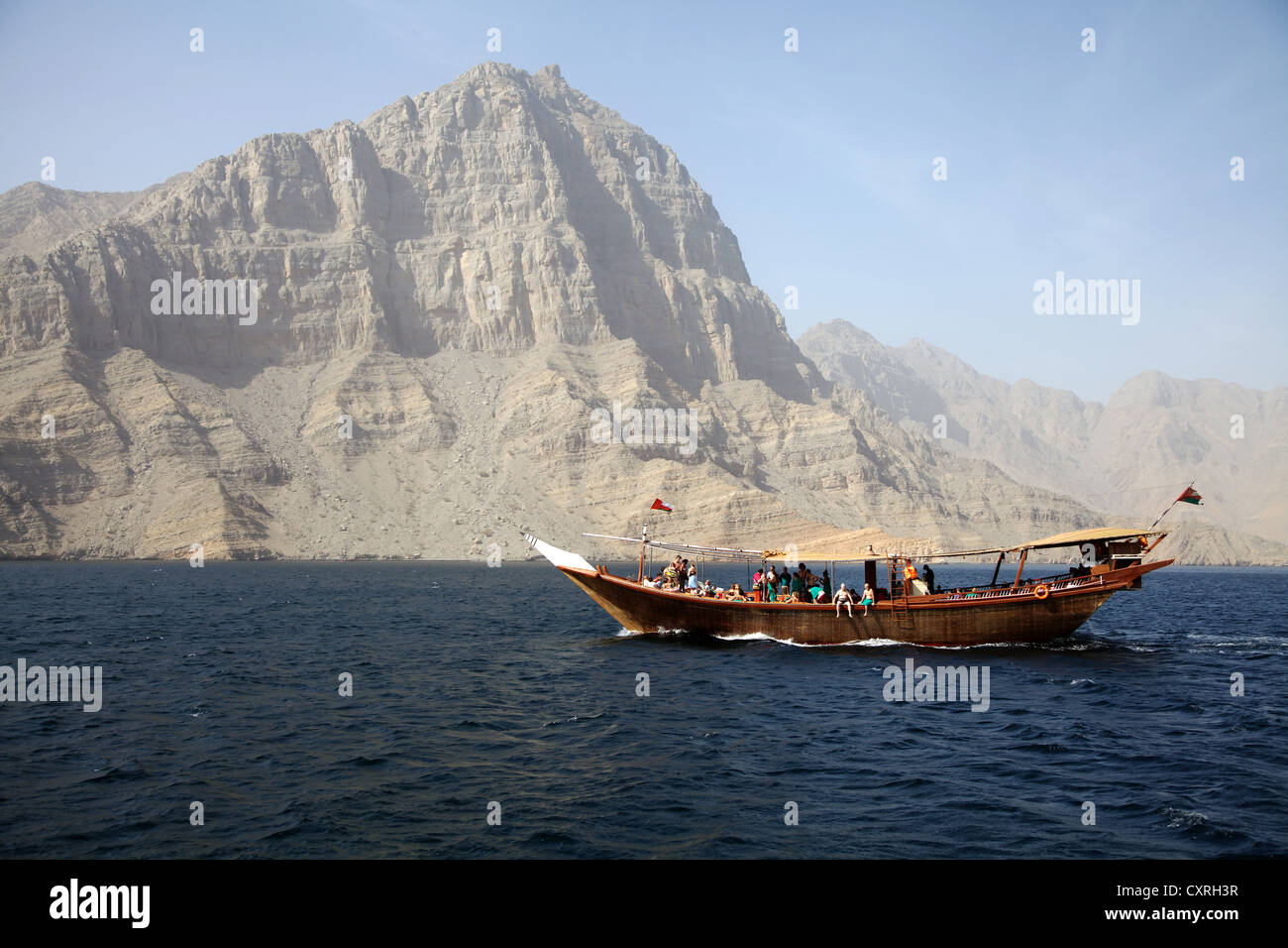 Dhow with tourists in the fjords of Musandam, Khasab, Oman, Middle East, Asia Stock Photo